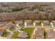 Aerial view of neighborhood with houses and trees at 2714 Stonewood Vw, Kannapolis, NC 28081