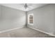 Cozy carpeted bedroom with ceiling fan and window at 2714 Stonewood Vw, Kannapolis, NC 28081