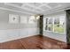 Formal dining room featuring hardwood floors, tray ceiling, and wainscoting at 2714 Stonewood Vw, Kannapolis, NC 28081