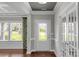 Bright entryway with hardwood floors, white trim and french doors at 2714 Stonewood Vw, Kannapolis, NC 28081