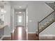 Hallway view with staircase and hardwood floors at 2714 Stonewood Vw, Kannapolis, NC 28081