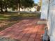 Outdoor patio featuring brick pavers and an exterior natural gas meter at rear of home at 4500 Doves Nest Ct, Matthews, NC 28105