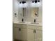 Bathroom boasts a double sink vanity with modern fixtures and ample lighting at 4500 Doves Nest Ct, Matthews, NC 28105