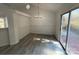 Modern dining room with stylish lighting and a sliding glass door at 4500 Doves Nest Ct, Matthews, NC 28105