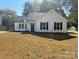 Lovely home with a bay window, black shutters and a well-maintained front yard at 4500 Doves Nest Ct, Matthews, NC 28105