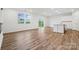 Open concept kitchen with island and white cabinets at 736 Olde England Dr, Lincolnton, NC 28092