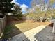 Large backyard with a patio and trees at 841 Settlement Dr, Clover, SC 29710