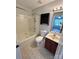 Bathroom features a bathtub, toilet, vanity, and dark wood cabinets at 841 Settlement Dr, Clover, SC 29710