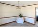 Bright dining room with wood trim and a chandelier at 2304 Fox Hunt Dr, Monroe, NC 28110