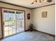 Dining area with slider leading to deck and backyard views at 2304 Fox Hunt Dr, Monroe, NC 28110