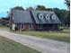 Charming brick home with a manicured lawn and driveway at 2304 Fox Hunt Dr, Monroe, NC 28110