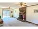 Living room with fireplace, slider to deck, and hardwood floors at 2304 Fox Hunt Dr, Monroe, NC 28110