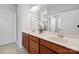 Neutral bathroom with double vanity, wood cabinets, tile floors and separate shower room for added privacy at 7095 Sunset Crater Pl, Lancaster, SC 29720