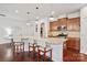 Spacious kitchen with granite countertops, stainless steel appliances, and a breakfast bar with seating at 7095 Sunset Crater Pl, Lancaster, SC 29720