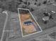 An aerial view of the property with approximate lot lines and the layout of the house at 9303 Reepsville Rd, Vale, NC 28168