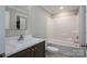 Bright bathroom includes a large vanity and shower-tub combo at 9303 Reepsville Rd, Vale, NC 28168