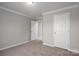 Spacious bedroom featuring neutral carpeting and light grey walls at 9303 Reepsville Rd, Vale, NC 28168