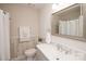 Bathroom with updated vanity, mirror, and shower/tub at 10933 Hunter Trail Ln, Charlotte, NC 28226