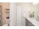 Bathroom featuring a vanity with marble countertop, toilet, and towel storage at 10933 Hunter Trail Ln, Charlotte, NC 28226