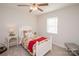 Bedroom with double hung window and comfortable furniture at 10933 Hunter Trail Ln, Charlotte, NC 28226