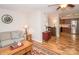 Inviting living room featuring a cozy sofa and stylish decor with wood floors at 10933 Hunter Trail Ln, Charlotte, NC 28226