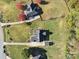 Overhead view highlighting home with gray roof, nestled in lush surroundings at 4225 Cheshire Glen Dr, Monroe, NC 28110