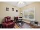 Bedroom featuring a comfortable recliner, desk area, and motivational posters at 4225 Cheshire Glen Dr, Monroe, NC 28110
