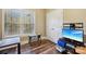 Bedroom featuring a small table, large window, and a television on a black stand at 4225 Cheshire Glen Dr, Monroe, NC 28110