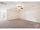 Large bonus room space with carpet at 4225 Cheshire Glen Dr, Monroe, NC 28110