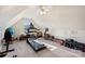 Bonus room features exercise equipment and ceiling fan at 4225 Cheshire Glen Dr, Monroe, NC 28110