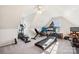 Bright bonus room space features a variety of exercise equipment at 4225 Cheshire Glen Dr, Monroe, NC 28110