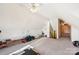 Carpeted bonus room with sloped ceilings and a ceiling fan offers flexible space at 4225 Cheshire Glen Dr, Monroe, NC 28110