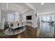 Elegant dining room featuring modern lighting, dining set, and hardwood flooring at 535 Red Wolf Ln, Clover, SC 29710