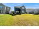 Lush backyard with manicured lawn, ideal for outdoor activities and enjoying the outdoors with view of back of house at 535 Red Wolf Ln, Lake Wylie, SC 29710