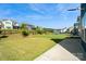 Expansive backyard view, perfect for outdoor activities and enjoying nature with community landscape at 535 Red Wolf Ln, Lake Wylie, SC 29710