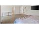 This large primary bedroom has light-colored walls, and features stairs and an entryway at 535 Red Wolf Ln, Lake Wylie, SC 29710