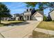 Charming two-story home with a manicured lawn and a two-car garage on a sunny day at 535 Red Wolf Ln, Lake Wylie, SC 29710