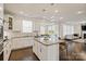 Charming kitchen with granite countertops, an island, stainless appliances, and lots of natural light at 535 Red Wolf Ln, Lake Wylie, SC 29710