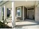 Inviting front porch with rocking chairs and stylish decor, perfect for relaxing and enjoying the outdoors at 535 Red Wolf Ln, Lake Wylie, SC 29710