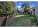 Large backyard with lush greenery and fence at 1017 N Sharon Amity Rd, Charlotte, NC 28211