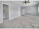 Bedroom with ensuite bathroom and grey walls at 1017 N Sharon Amity Rd, Charlotte, NC 28211