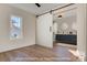 Modern bathroom with double vanity, walk-in shower, and barn door at 103 2Nd Nw Ave, Hickory, NC 28601