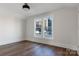 Spacious bedroom featuring hardwood floors and large windows at 103 2Nd Nw Ave, Hickory, NC 28601