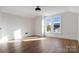 Bright bedroom with hardwood floors and two windows at 103 2Nd Nw Ave, Hickory, NC 28601