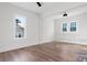 Bedroom with hardwood floors and a view of the backyard at 103 2Nd Nw Ave, Hickory, NC 28601