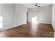 Bright bedroom with hardwood floors and ceiling fan at 103 2Nd Nw Ave, Hickory, NC 28601