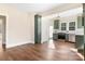 Open dining room with hardwood floors and kitchen views at 103 2Nd Nw Ave, Hickory, NC 28601