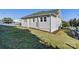 Rear view of the house with a well-maintained lawn at 103 2Nd Nw Ave, Hickory, NC 28601