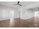 Open living space with hardwood floors and built-in shelving at 103 2Nd Nw Ave, Hickory, NC 28601