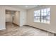 Bright foyer with vinyl plank flooring and access to main living areas at 165 Smokey Way, Statesville, NC 28625